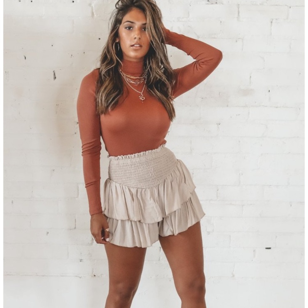 Rust turtleneck top